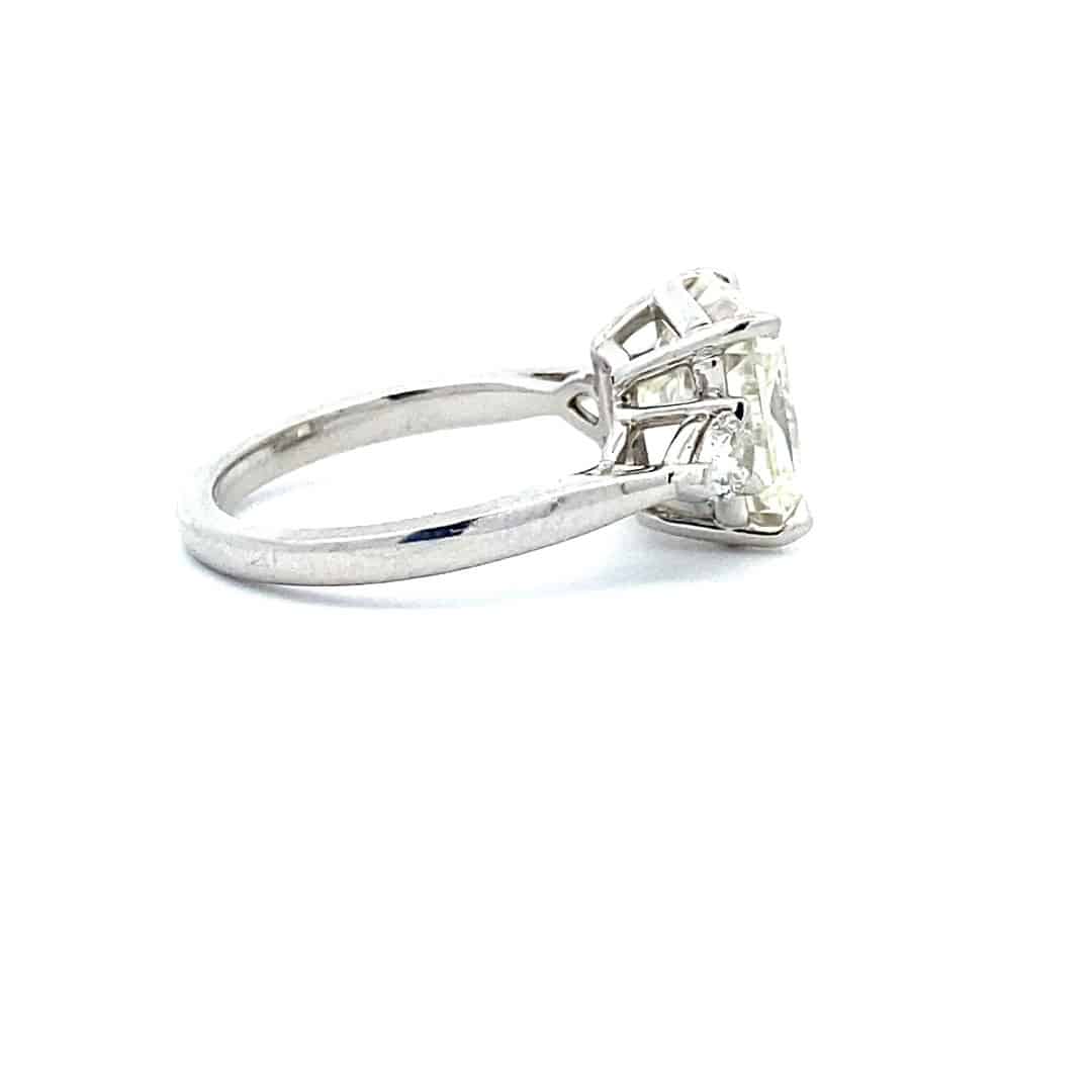Radiant and Pear Three-Stone Diamond Engagement Ring in Platinum