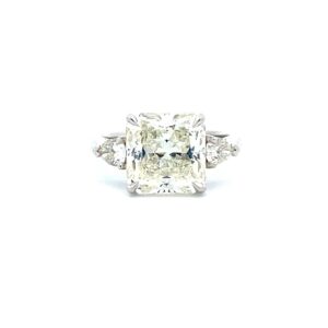 Radiant and Pear Three-Stone Diamond Engagement Ring in Platinum