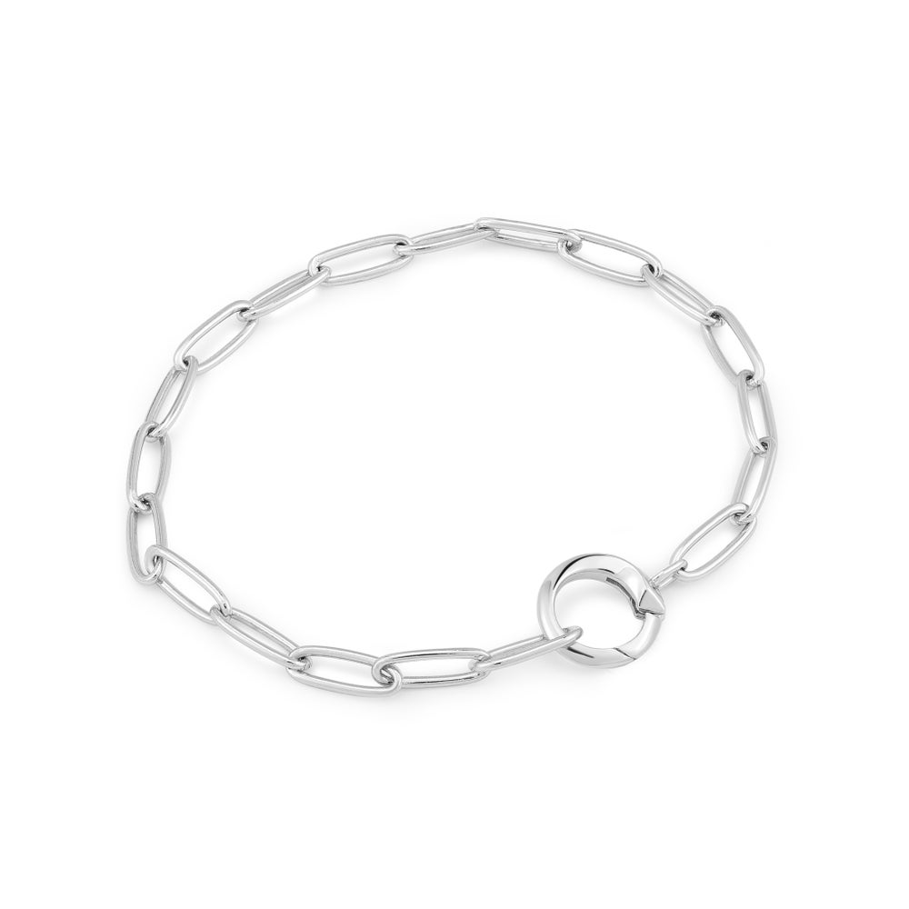 A sterling silver paperclip-link bracelet with a ring able to hold charms