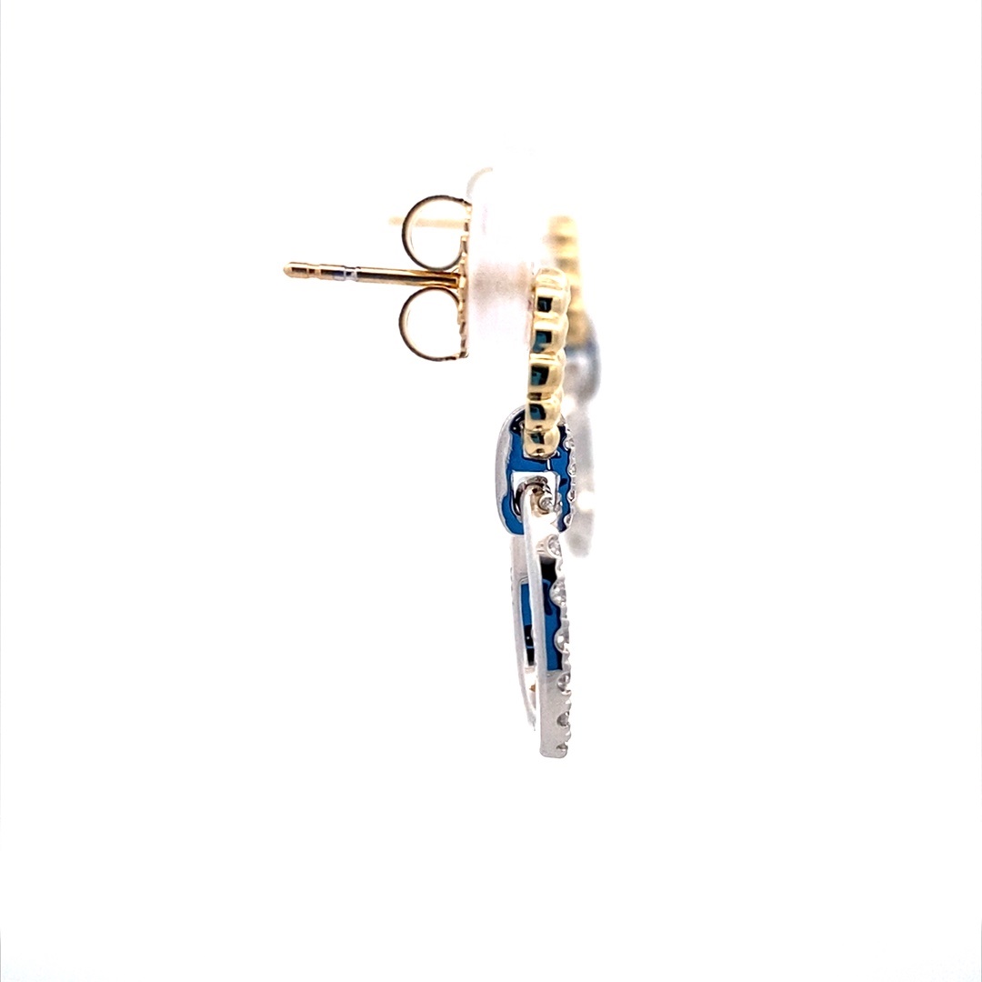A pair of oval front hoop earrings set with diamonds in two-tone gold