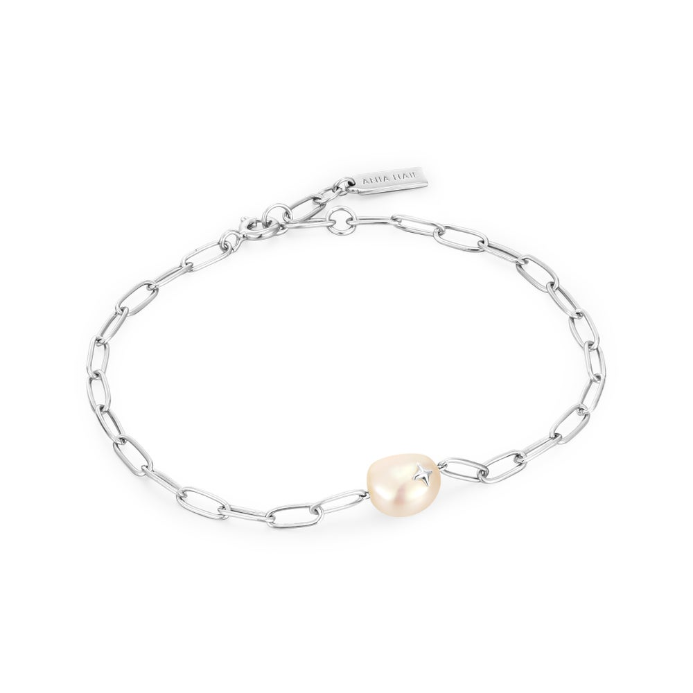 A sterling silver chunky chain bracelet with a pearl pendant and silver sparkle accent