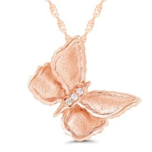 A rose gold diamond butterfly pendant necklace set with 3 round diamonds
