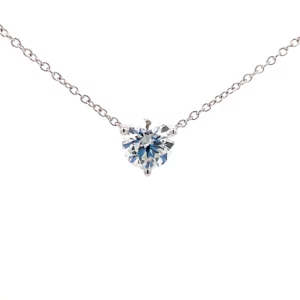 One 14 karat white gold diamond solitaire necklace containing one lab-grown round brilliant-cut diamond weighing 1.06 carats with G color and VS1 clarity in a three-prong setting. The lab grown diamond is laser inscribed with an IGI identification number and measures 6.55mm - 6.57mm diameter X 4.00mm deep. The pendant is fixed on an 18" chain.