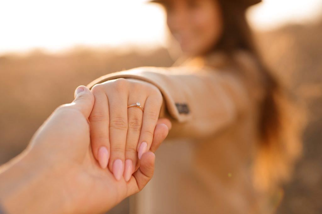 woman-diamond-engagement-ring-hand