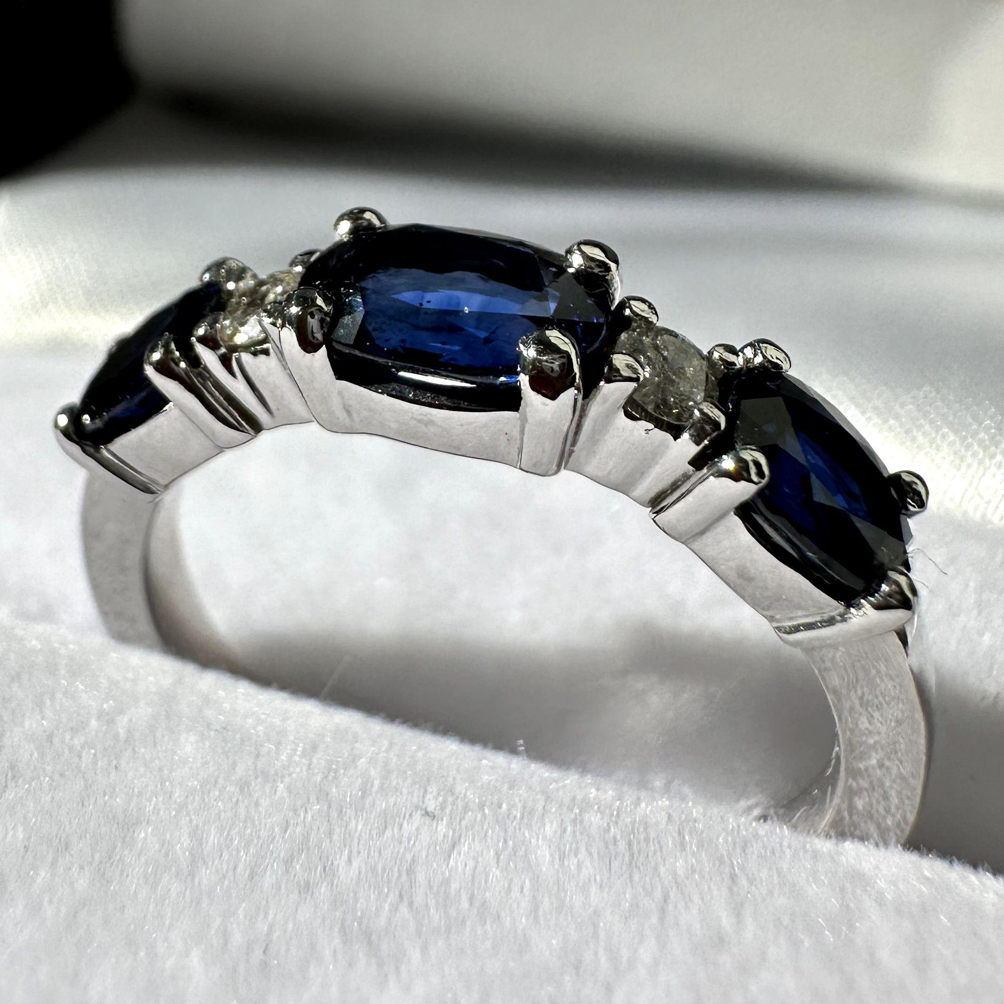 A custom design final product, a sapphire and diamond band