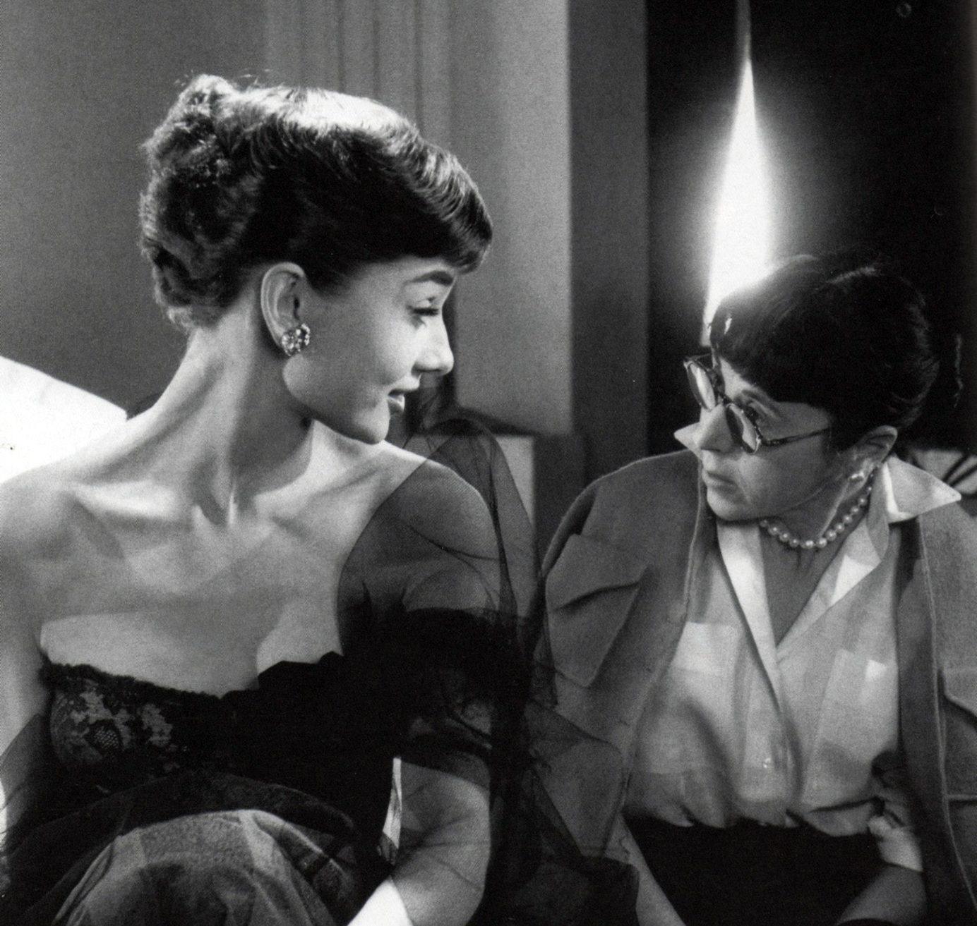 "Audrey Hepburn and Edith Head, 1953. Cropped from original." by thefoxling is licensed under CC BY-NC-SA 2.0 .