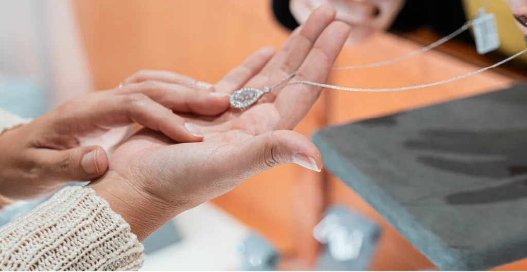 Customer examining a jewelry piece